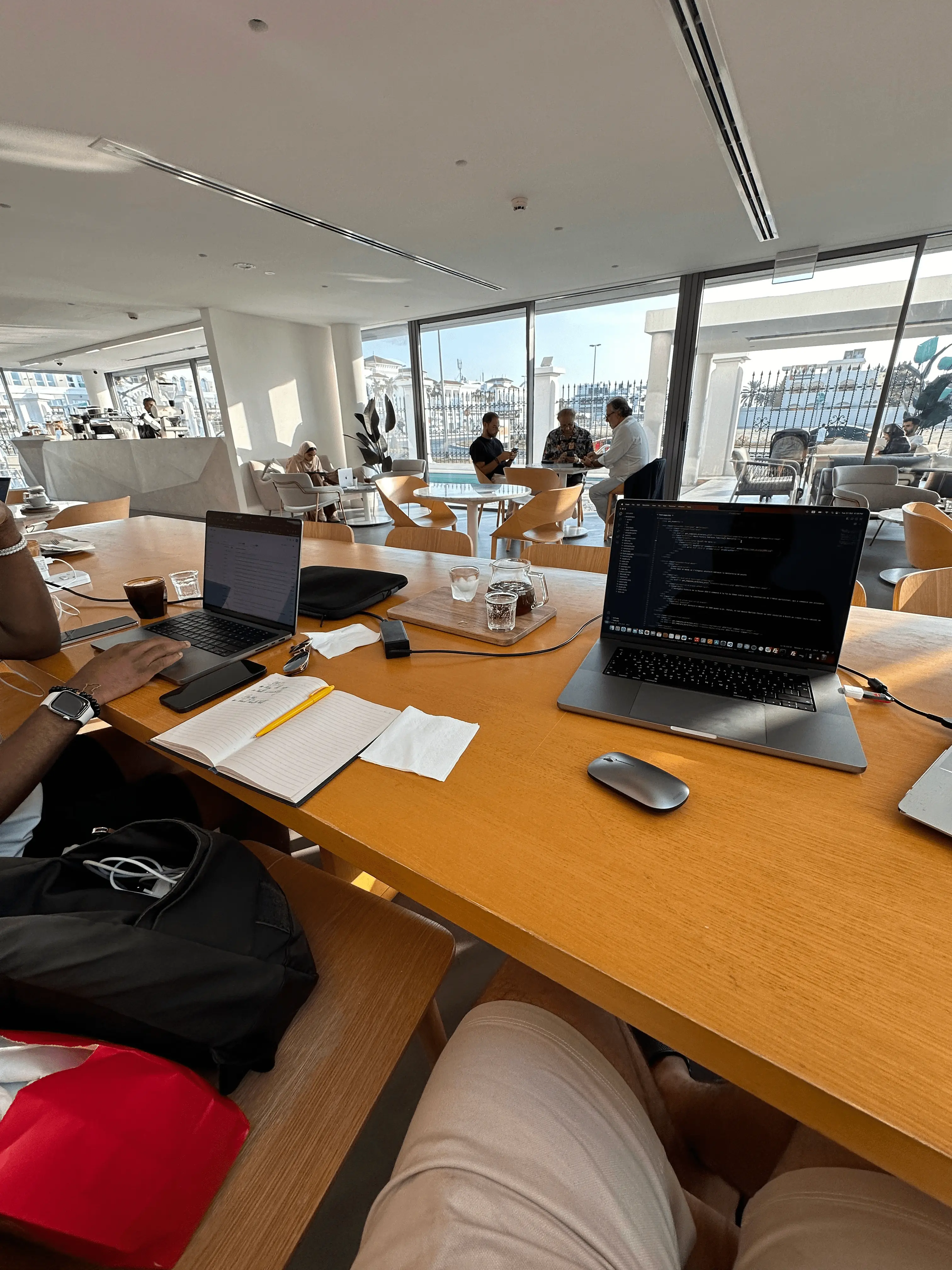 Letket team member coding in a cozy coffeeshop in Istanbul.