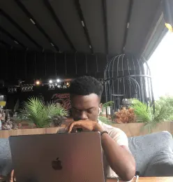 Letket team member coding on the beach in Marmaris.