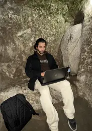 Letket team member coding on a mechanical keyboard.