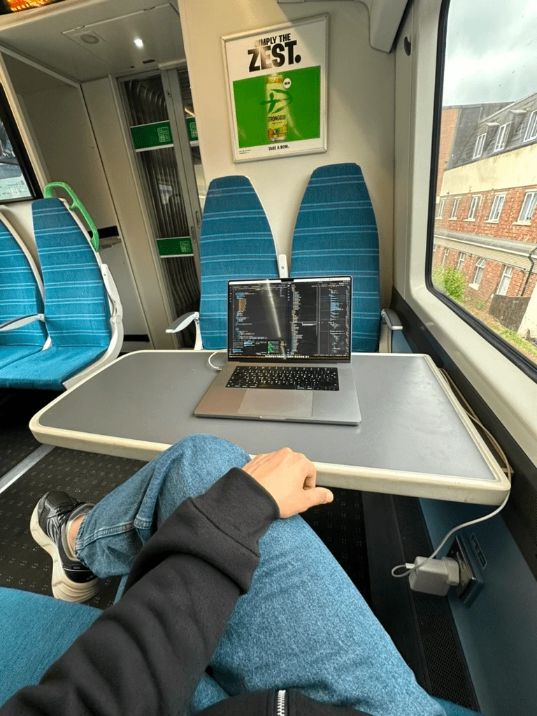 Letket team members working on a project in a cozy coffeeshop in Istanbul.