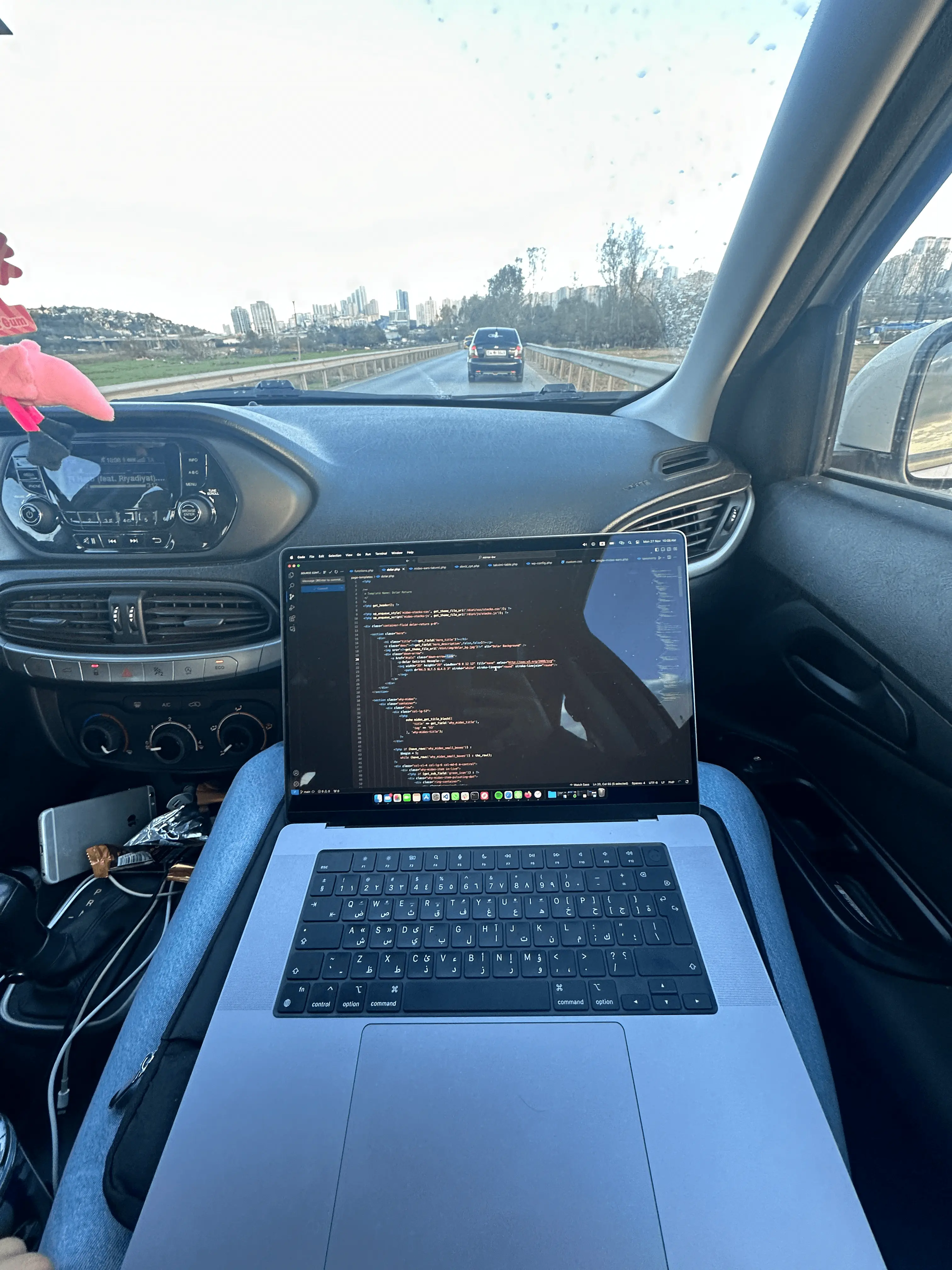 Letket team member coding in a cozy coffeeshop in London.